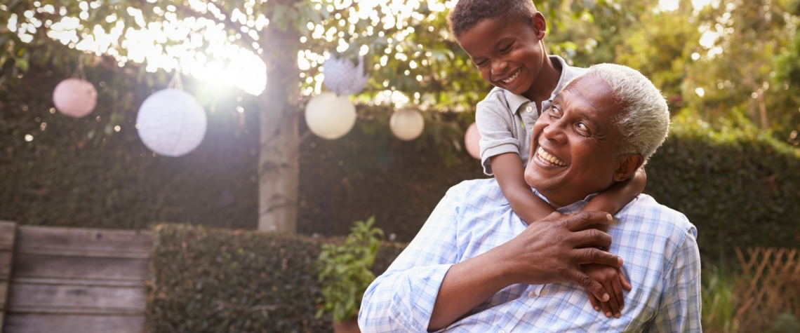 A retired grandfather plays with his grandson