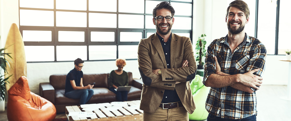 Two men in a modern work space