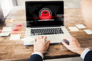 Laptop computer with the system being locked by ransomware cyber attack
