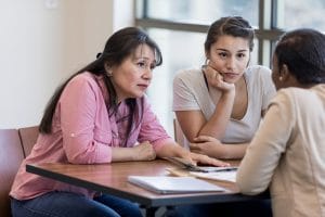 Women meeting with bank employee
