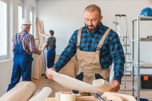 Contractor Checking a Blueprint