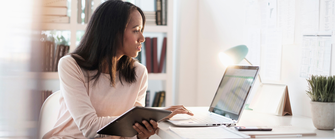 Woman sitting in front of her laptop