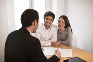 Woman man advisor office  contract house investment computer