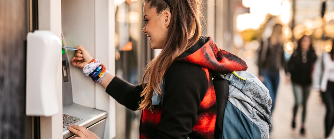 Image of woman at ATM