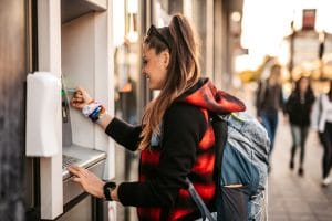 Image of woman at ATM